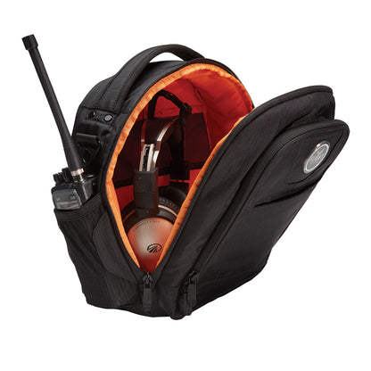 Black backpack with orange interior, containing a golf club and other items, on a white background.